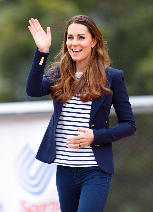 Catherine, Duchess of Cambridge waves as she leaves the Copper Box Arena in the Queen Elizabeth Olympic Park after attending a SportsAid Athlete Workshop on October 18, 2013 in London, England.