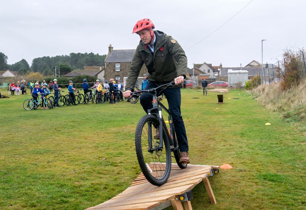 Prince William rides a mountain bike at Outfit Moray