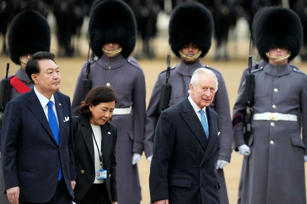 King Charles and President Yoon Suk Yeol inspect a Guard of Honour, formed by F Company Scots Guards
