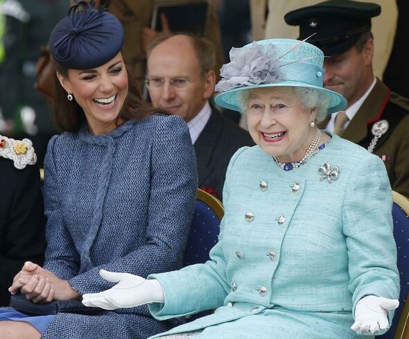 Kate and the queen laughing