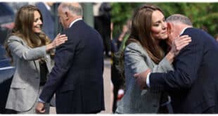 Princess Kate warmly hugging Jamie Lowther-Pinkerton, Prince George’s godfather, during her visit to Sudbury Silk Mills