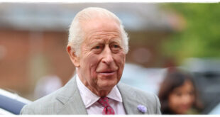 King Charles smiling as he makes a dark-humored joke about his health during a royal event