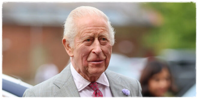 King Charles smiling as he makes a dark-humored joke about his health during a royal event