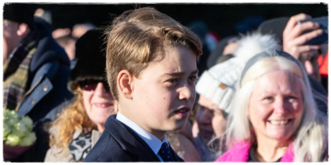 Prince George smiling during the Christmas walkabout after a well-wisher mentioned Princess Diana